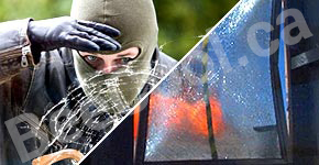 burglar looking in through broken glass and window shattered held together by safety film.