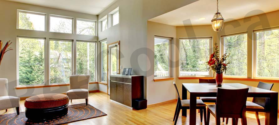 Interior of living room and dining room with Bee Cool sun control film product installed.