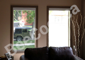 Red Deer window showing privacy film verses no privacy film.